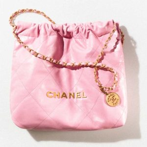 Replica Chanel Women 22 Small Handbag Shiny Calfskin & Gold-Tone Metal Pink